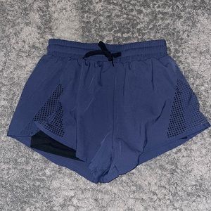 Blue athletic shorts with built in underwear